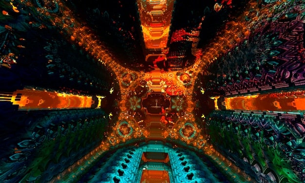 A wide shot of a large concert crowd, with indigenous symbols and artwork projected onto the stage backdrop, illuminated by colorful stage lights.